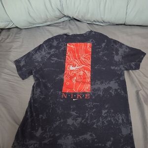 Nike Men's Black Tee with Red Graphic